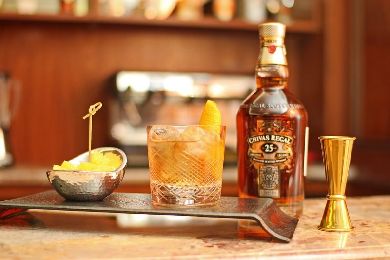 Orion Hotel Biskek Kültér fotó A bottle of 25 year old Chivas Regal