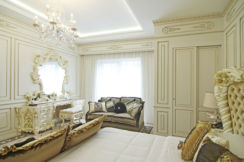 Orion Hotel Biskek Kültér fotó A bedroom