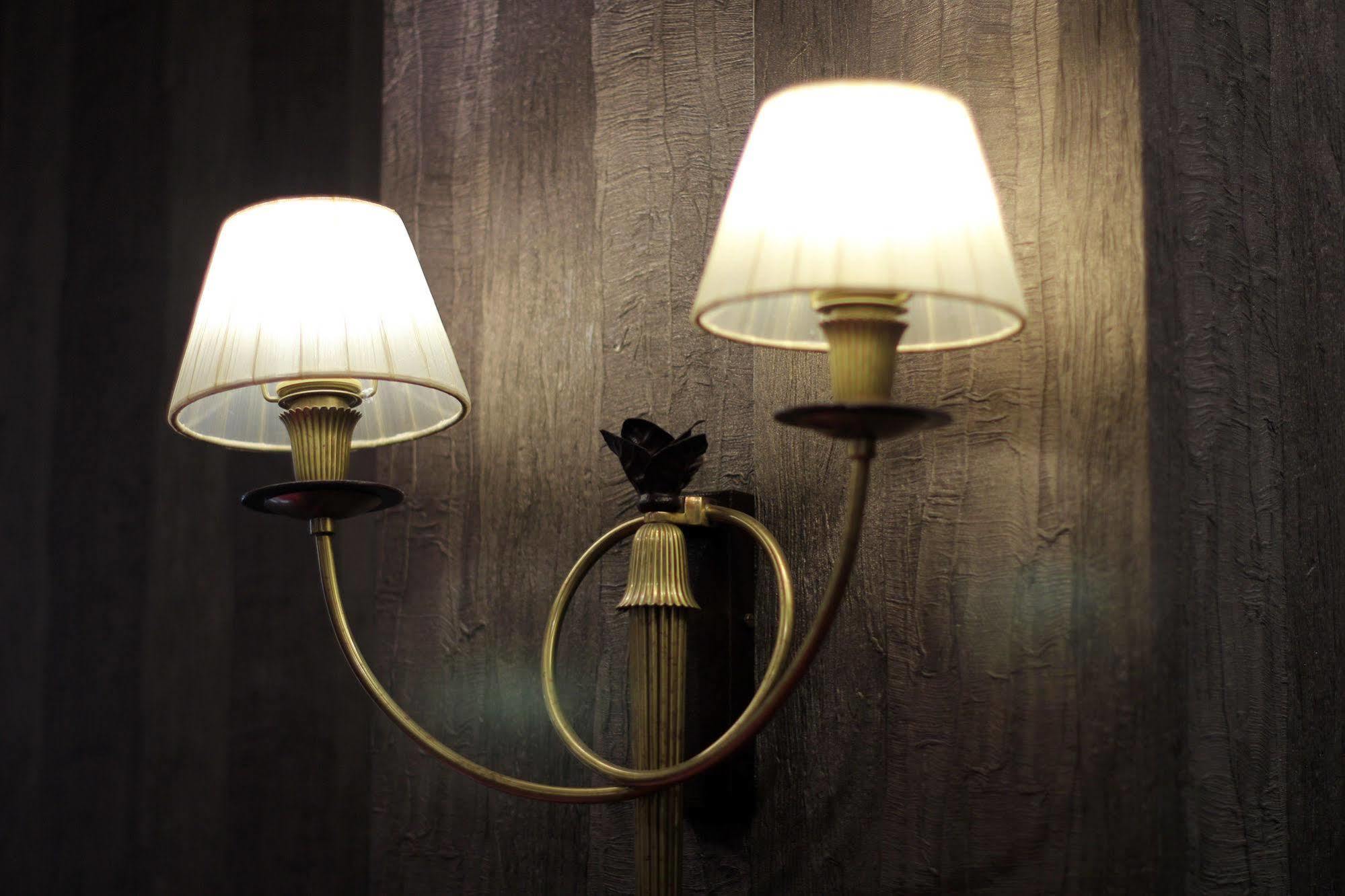 Orion Hotel Biskek Kültér fotó A wall light